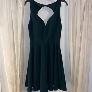 Hunter green homecoming dress. Size 1/2. Polyester/spandex.